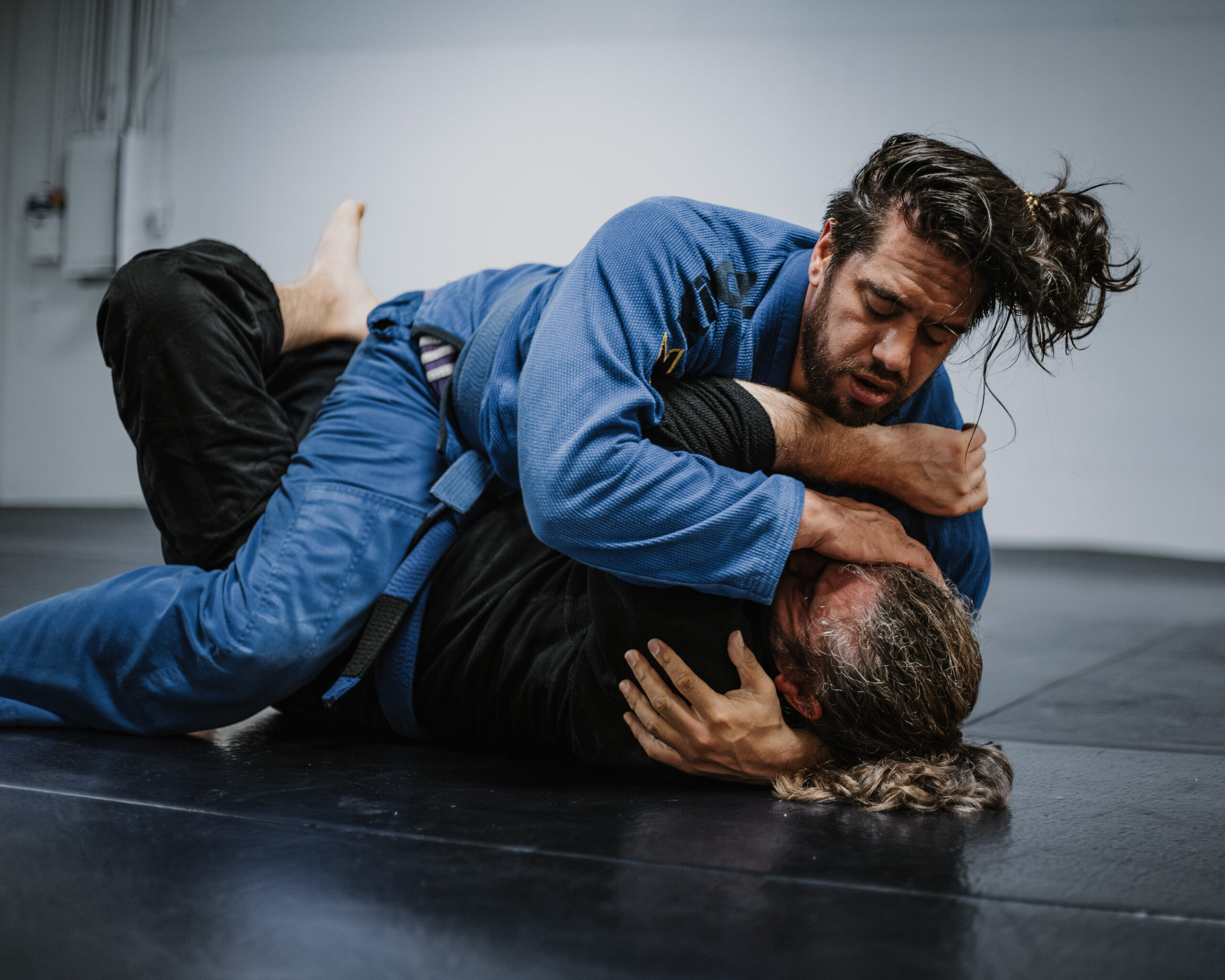 Brazilian Jiu-Jitsu beginner technique instruction at MA BJJ Academy in Irving